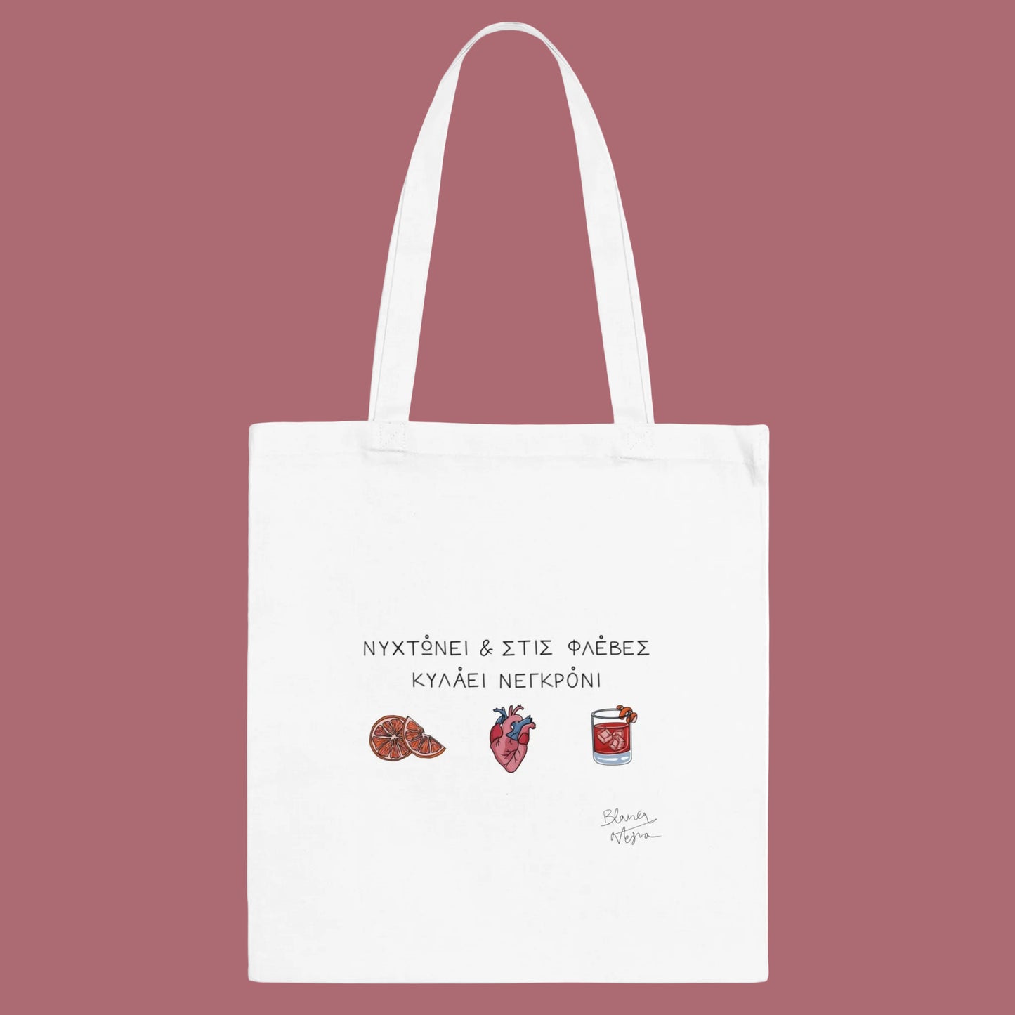 White tote bag with text and illustrations on a white background
