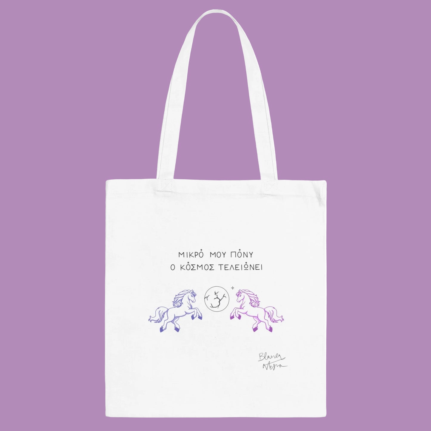 White tote bag with unicorn design and text on a white background